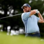 Oosthuizen battles to under par start