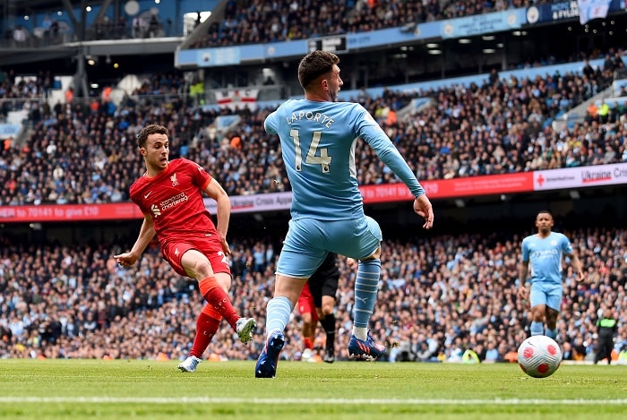You are currently viewing Liverpool hit back twice to earn draw against Manchester City