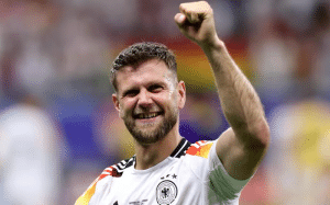 Read more about the article Fullkrug nets late equaliser as Germany top Group A